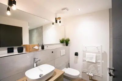 Ein Badezimmer in der Unterkunft Chalet Bergzeit Family Wellness Suite