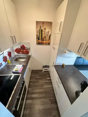 Küche/Küchenzeile in der Unterkunft FeWo Insel der Erholung mit Pool & Sauna