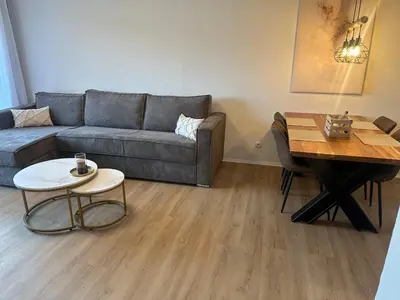 Ein Sitzbereich in der Unterkunft Panorama Apartment