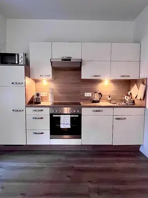 Küche/Küchenzeile in der Unterkunft Apartment Heimathain - Holiday Living