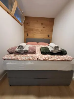 Ein Bett oder Betten in einem Zimmer der Unterkunft FW Rakovic