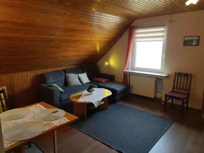 Ein Sitzbereich in der Unterkunft Ferienwohnung Harz de Luchs