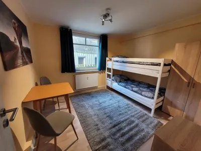 Ein Bett oder Betten in einem Zimmer der Unterkunft Kreuztaloase