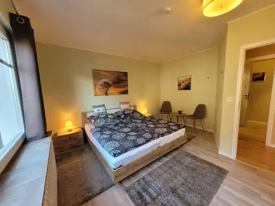 Ein Bett oder Betten in einem Zimmer der Unterkunft Kreuztaloase