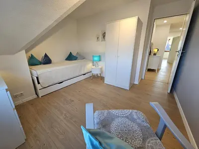 Ein Bett oder Betten in einem Zimmer der Unterkunft Ferienwohnung Starke