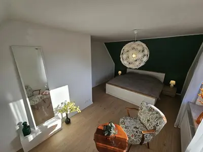 Ein Bett oder Betten in einem Zimmer der Unterkunft Ferienwohnung Starke