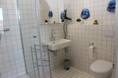 Ein Badezimmer in der Unterkunft Hexnquartier