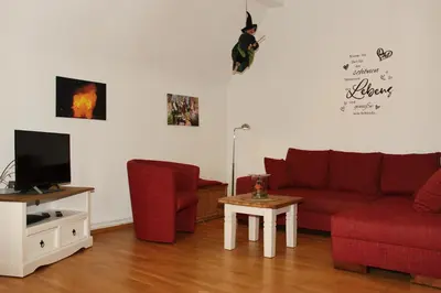 Ein Sitzbereich in der Unterkunft Hexnquartier