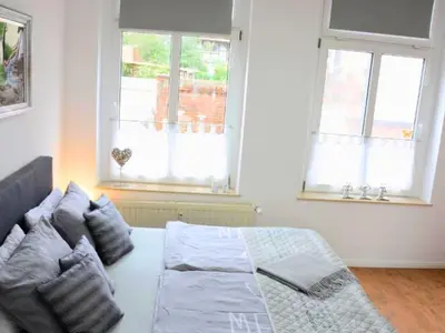 Ein Bett oder Betten in einem Zimmer der Unterkunft Harzvorland-Auszeit für 2 & Hund & Natur inklusive
