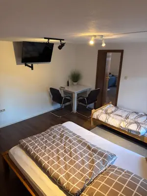 Ein Bett oder Betten in einem Zimmer der Unterkunft Unterkunft im Zentrum der Stadt