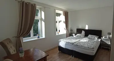 Ein Bett oder Betten in einem Zimmer der Unterkunft Ferienwohnung Maja