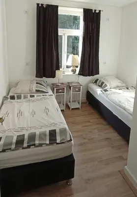 Ein Bett oder Betten in einem Zimmer der Unterkunft Ferienwohnung Maja