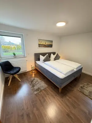Ein Bett oder Betten in einem Zimmer der Unterkunft Wildpark Perle