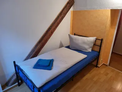 Ein Bett oder Betten in einem Zimmer der Unterkunft Ferienhaus 