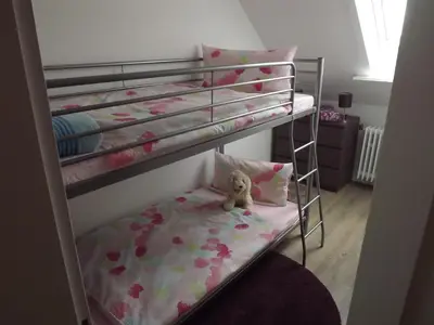 Ein Bett oder Betten in einem Zimmer der Unterkunft Torfhaus-Blick