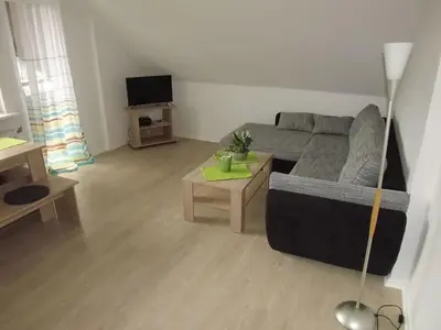 Ein Sitzbereich in der Unterkunft Torfhaus-Blick