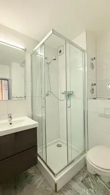Ein Badezimmer in der Unterkunft Family Lodge - familienfreundliches Appartement mit zwei Schlafzimmern im Ferienpark Hahnenklee