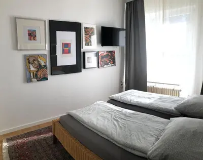 Ein Bett oder Betten in einem Zimmer der Unterkunft Tiny Atelier Leihfahrräder Gratis Shuttleservice