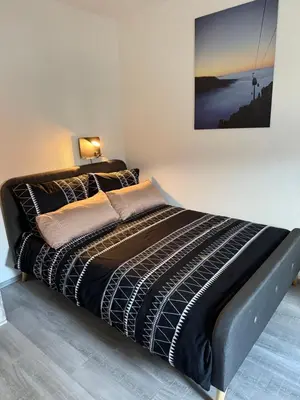 Ein Bett oder Betten in einem Zimmer der Unterkunft Guestroom K17