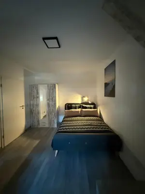 Ein Bett oder Betten in einem Zimmer der Unterkunft Guestroom K17