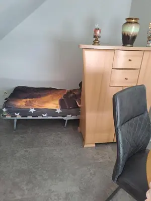 Ein Bett oder Betten in einem Zimmer der Unterkunft Ferienwohnung Hartmann