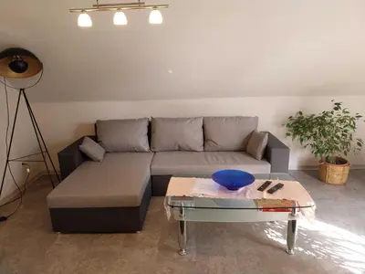 Ein Sitzbereich in der Unterkunft Ferienwohnung Hartmann