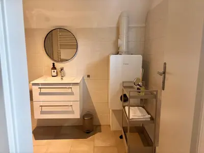 Ein Badezimmer in der Unterkunft HyggeLiving - 94 qm - Blick auf Marktkirche - 65 Zoll TV - Hunde - NEU