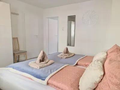 Ein Bett oder Betten in einem Zimmer der Unterkunft Ferienwohnung Rieger 3
