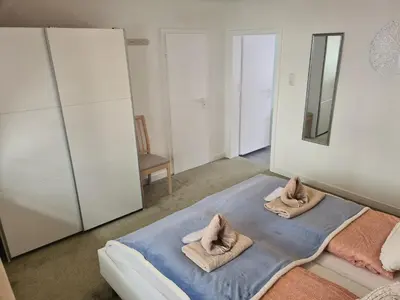 Ein Bett oder Betten in einem Zimmer der Unterkunft Ferienwohnung Rieger 3