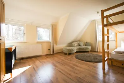 Ein Bett oder Betten in einem Zimmer der Unterkunft Ferienhaus Blocksberg