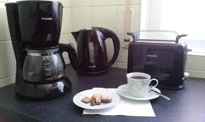 Kaffee-/Teezubehör in der Unterkunft Ferienwohnung Harzluchs mit Balkon & Sauna im Haus
