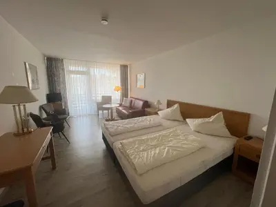 Ein Bett oder Betten in einem Zimmer der Unterkunft Haus Vier Jahreszeiten am See Die Stille