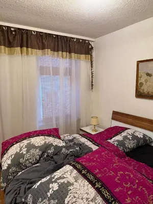 Ein Bett oder Betten in einem Zimmer der Unterkunft Ferienwohnung in Thale