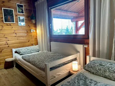 Ein Bett oder Betten in einem Zimmer der Unterkunft Zum Vogelhäuschen