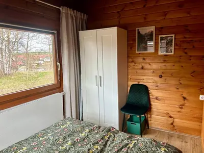 Ein Bett oder Betten in einem Zimmer der Unterkunft Zum Vogelhäuschen