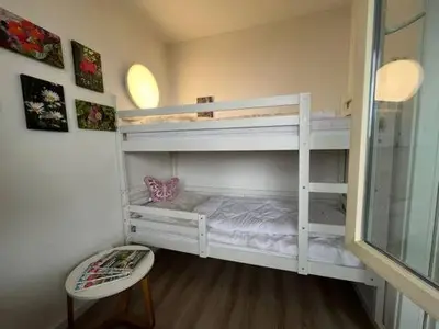 Ein Bett oder Betten in einem Zimmer der Unterkunft Oben in der 14 Etage