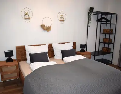 Ein Bett oder Betten in einem Zimmer der Unterkunft Harz Huus Apartment 