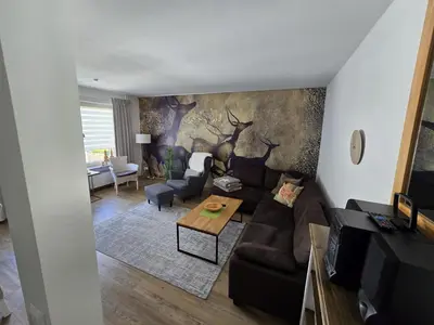 Ein Sitzbereich in der Unterkunft Ferienwohnung Am Hasselkopf 1