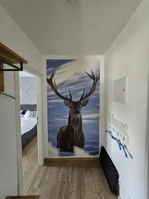 Ein Bett oder Betten in einem Zimmer der Unterkunft Ferienwohnung Am Hasselkopf 1