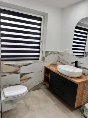 Ein Badezimmer in der Unterkunft FeWo Gold