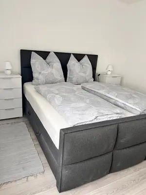 Ein Bett oder Betten in einem Zimmer der Unterkunft FeWo Gold