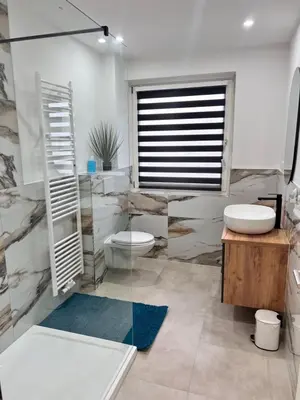 Ein Badezimmer in der Unterkunft FeWo Gold