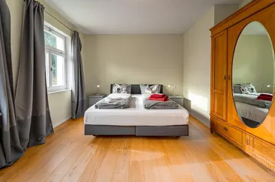 Ein Bett oder Betten in einem Zimmer der Unterkunft Forsthaus Wohnung 1 6 Pers Kamin & Waldluft