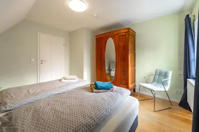 Ein Bett oder Betten in einem Zimmer der Unterkunft Forsthaus Wohnung 2 4 Pers Kamin & Balkon