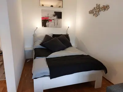 Ein Bett oder Betten in einem Zimmer der Unterkunft Ferienwohnung Kuschelplatz