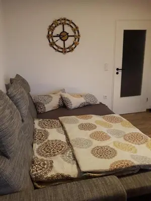 Ein Bett oder Betten in einem Zimmer der Unterkunft Ferienwohnung Pfeiffer klein