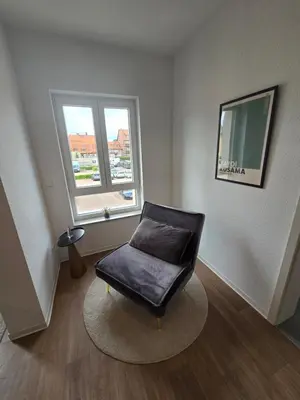 Ein Sitzbereich in der Unterkunft Sonnenblick Suite 2