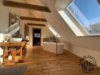 Ein Sitzbereich in der Unterkunft HARZER HEALING CENTER 2025 Himmlische Landhauswohnung mit Fussbodenheizung,XXL Kochinsel,XXL Regendusche,Modern,Hochwertig,Persönlich,Vollausgestattet