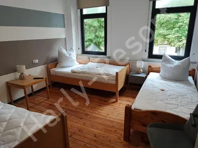 Ein Bett oder Betten in einem Zimmer der Unterkunft Harly-Resort
