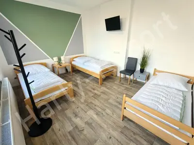 Ein Bett oder Betten in einem Zimmer der Unterkunft Harly-Resort